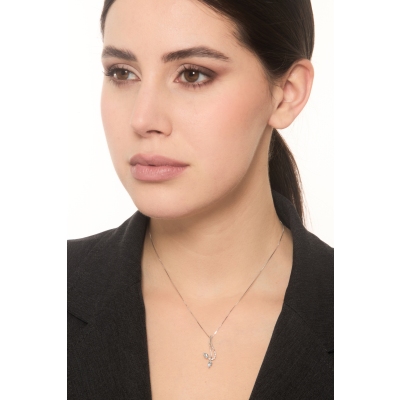 Collana in oro bianco 18k con pendente sinuoso in diamanti e acquamarine