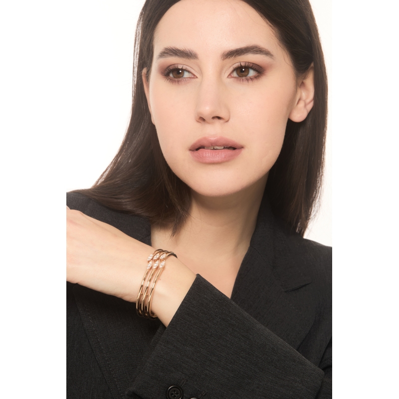 Bracciale design in oro rosa 18k con diamanti 
