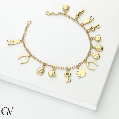 Bracciale in oro giallo 18k con charms portafortuna