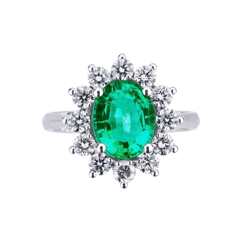 Halo ring with diamonds and emerald oval cut white gold 18k