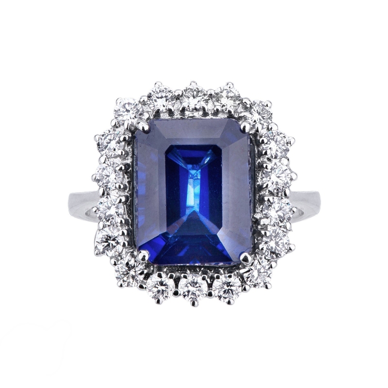 White gold 18k halo ring with blue sapphire emerald cut and diamonds 