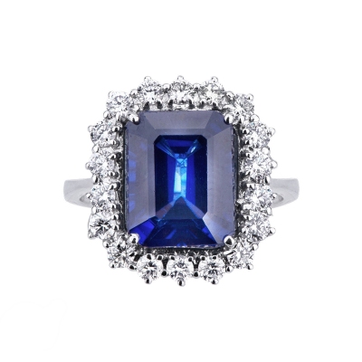 White gold 18k halo ring with blue sapphire emerald cut and diamonds 