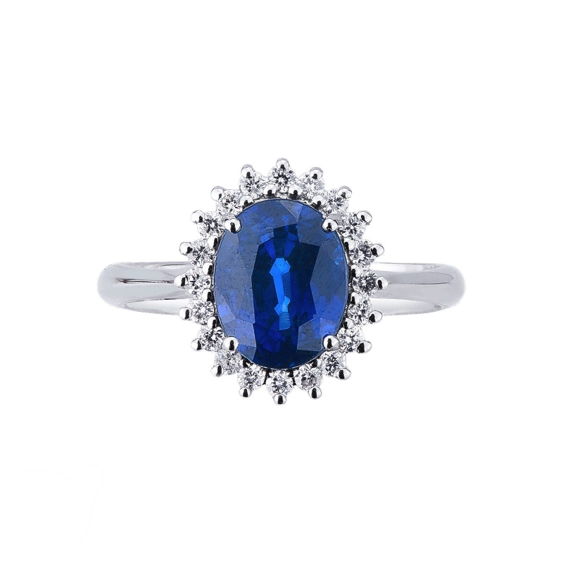 Halo ring with diamonds and blue sapphire oval cut white gold 18k