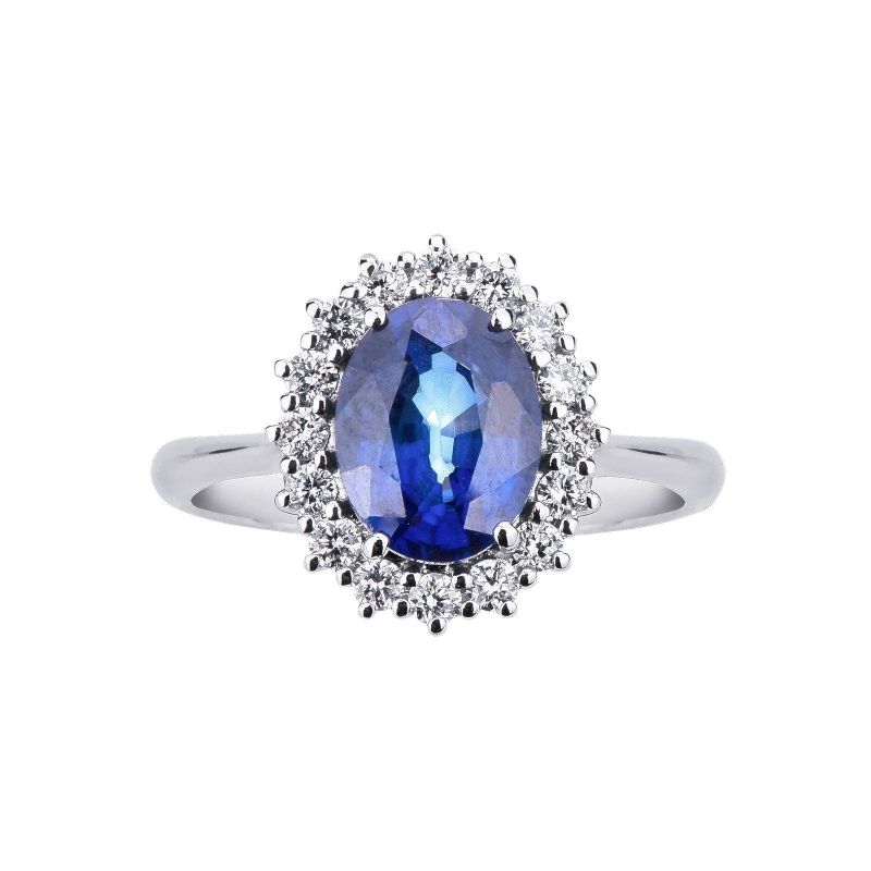 White gold 18k ring with a blue sapphire and diamonds