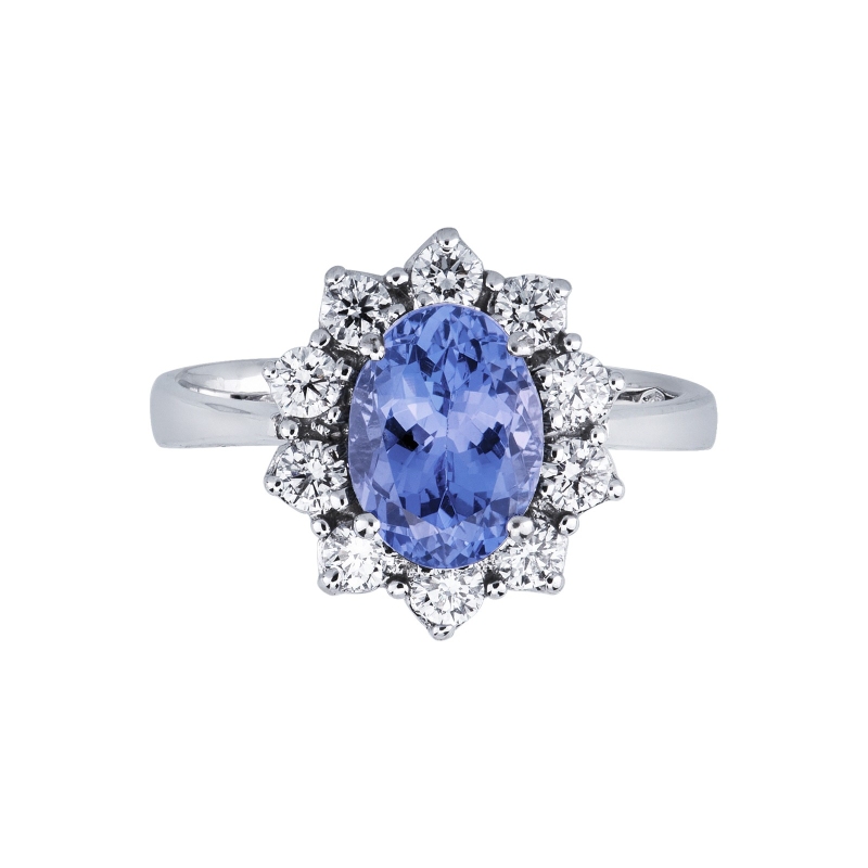 18k white gold halo ring with an oval tanzanite and diamonds