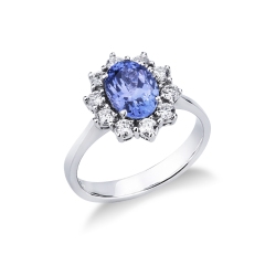 18k white gold halo ring with an oval tanzanite and diamonds