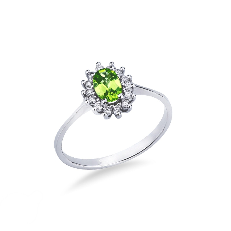 Anello contorno peridoto verde e diamanti in oro bianco 18kt