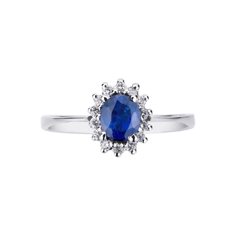 Halo ring with oval cut blue sapphire and diamonds in white gold 18k