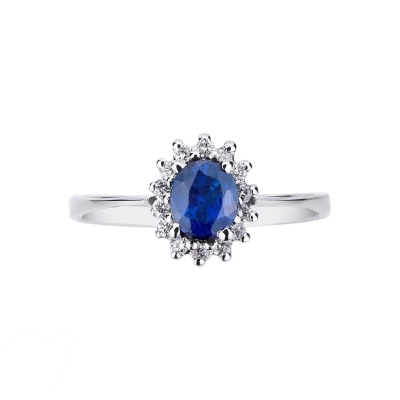 Halo ring with oval cut blue sapphire and diamonds in white gold 18k