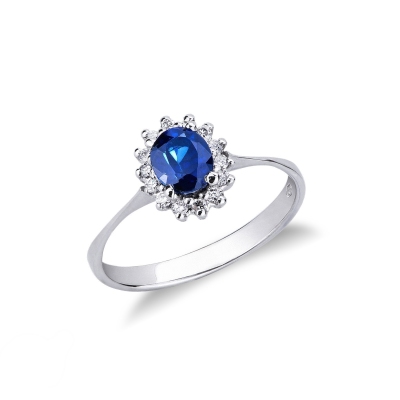 Halo ring with oval cut blue sapphire and diamonds in white gold 18k