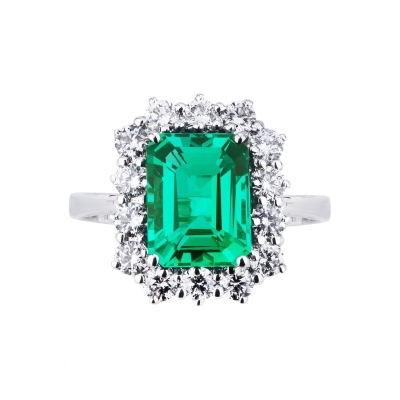 White gold 18k halo ring with diamonds and emerald 