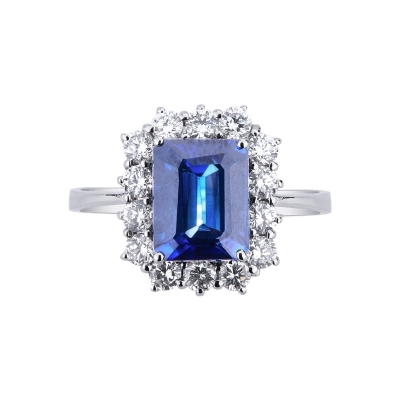 Halo ring white gold 18k with diamonds and blue sapphire emerald cut 