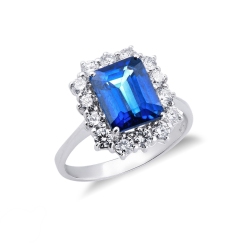 Halo ring white gold 18k with diamonds and blue sapphire emerald cut 