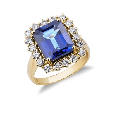 Halo ring with blue sapphire and diamonds in yellow gold 18k