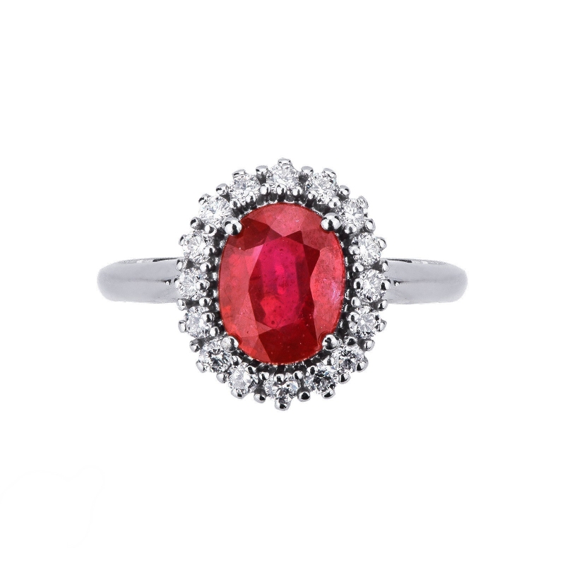 Halo ring with a central ruby and diamonds white gold 18k