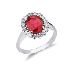 Halo ring with a central ruby and diamonds white gold 18k