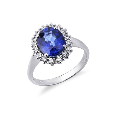 White gold 18k halo ring with a central blue sapphire and diamonds 