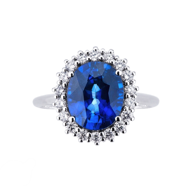Halo ring white gold 18k with a central blue sapphire and diamonds 