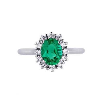 Halo ring with diamonds and central emerald in white gold 18k