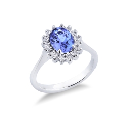 18k white gold halo ring with big central tanzanite and diamonds