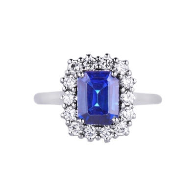Halo ring white gold 18k with diamonds and central blue sapphire 