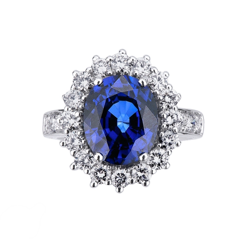 Halo ring white gold 18k with diamonds and blue sapphire
