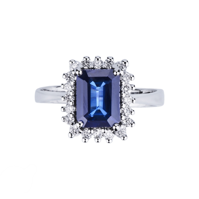 White gold 18k halo ring with diamonds and blue sapphire 