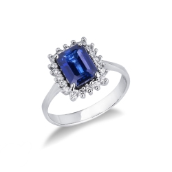 White gold 18k halo ring with diamonds and blue sapphire 