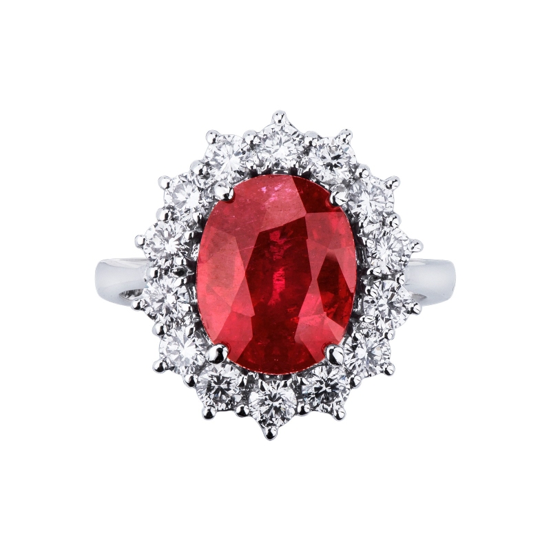 18k white gold halo ring with oval Ruby crowned by diamonds