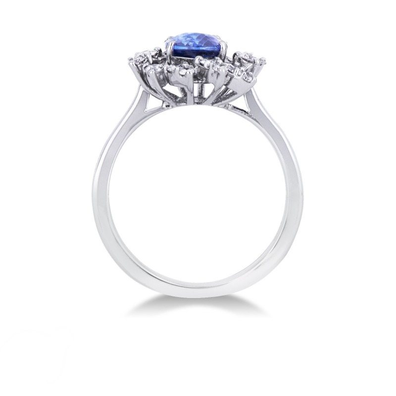 White gold 18k diamond halo ring with a central blue sapphire