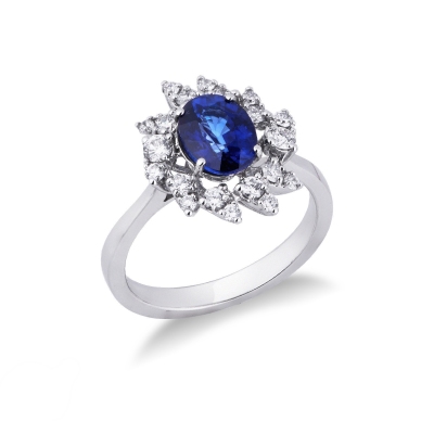 White gold 18k diamond halo ring with a central blue sapphire