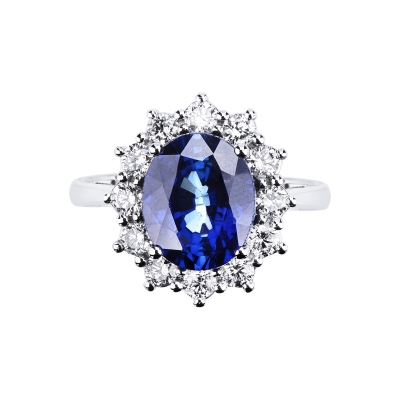White gold 18k halo ring with blue sapphire and diamonds 