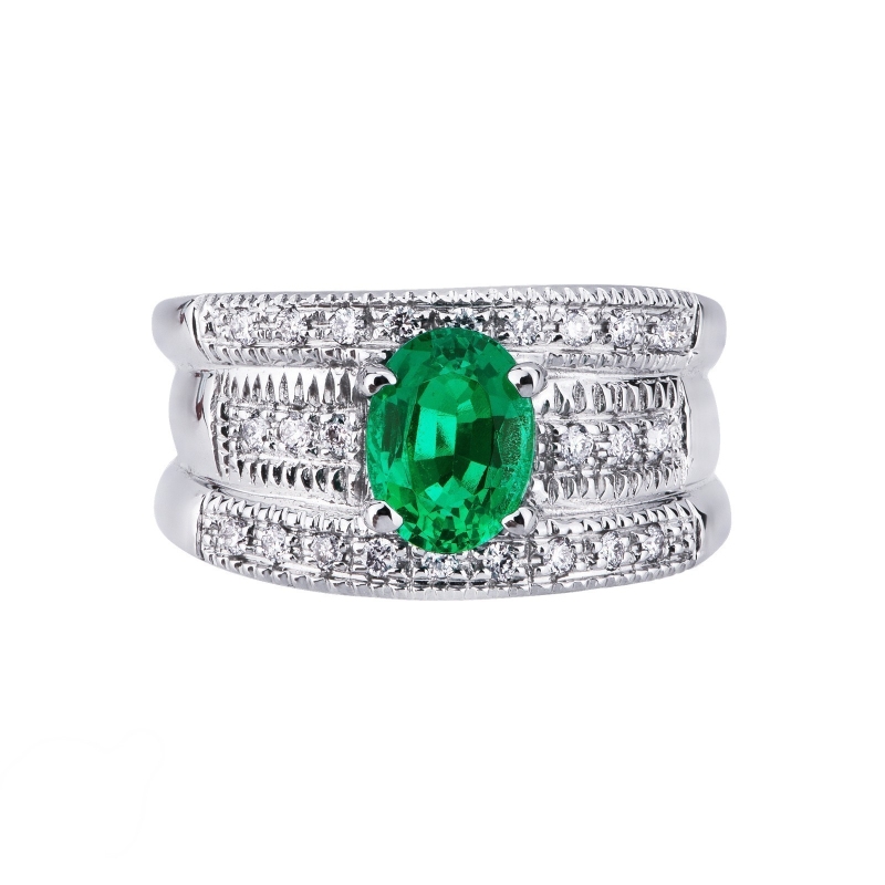 Band ring with a central emerald and diamonds in white gold 18k