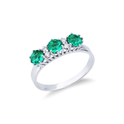 White gold 18k ring with emeralds and diamonds 