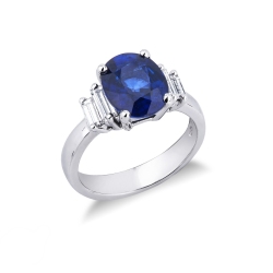 White gold 18k ring with blue sapphire and diamonds baguette cut  