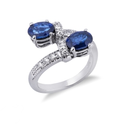 White gold 18k curved shank ring with blue sapphires oval cut and diamonds 