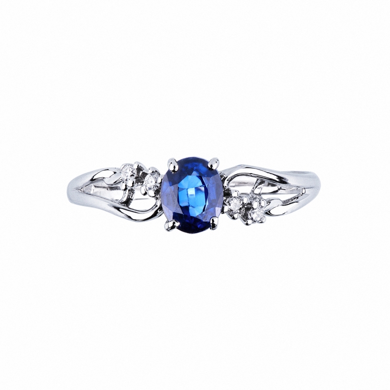 White gold 18k ring with a tangle of blue sapphire and diamonds 