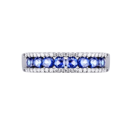 18k white gold ring with a central row of blue sapphires and diamonds 