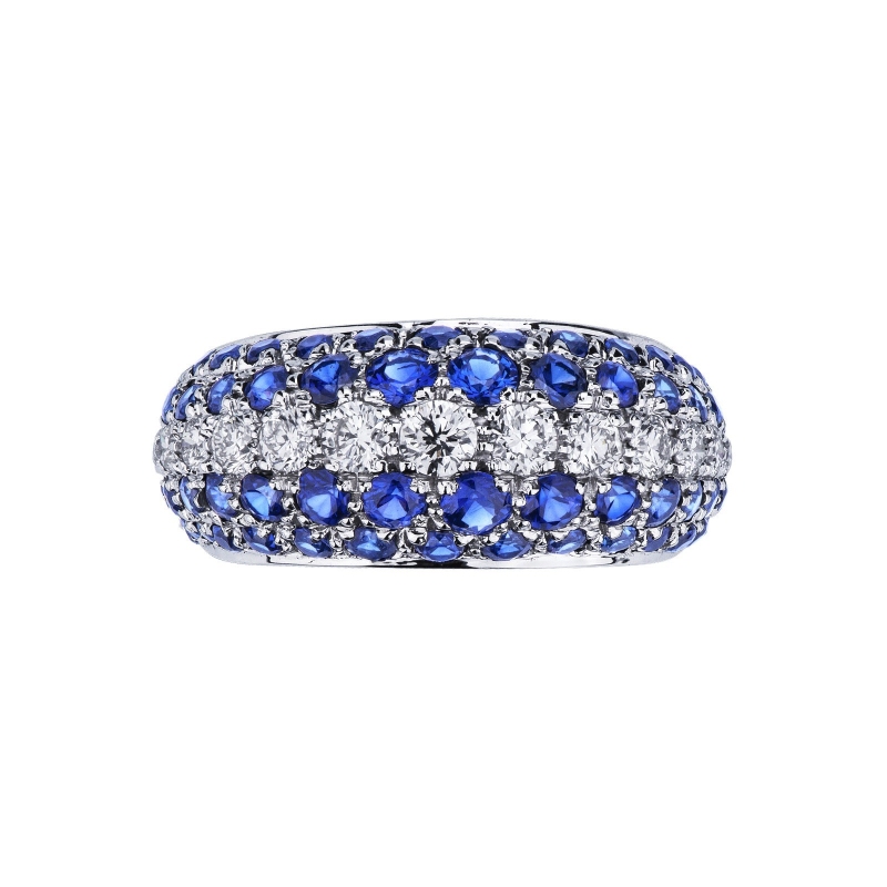 18k white gold ring with a central blue sapphire and diamonds 