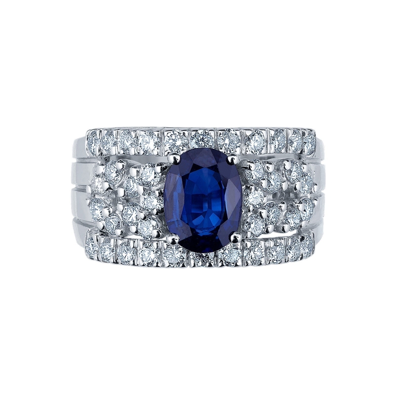 Band ring with diamonds a central blue sapphire