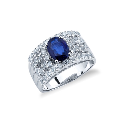 Band ring with diamonds a central blue sapphire