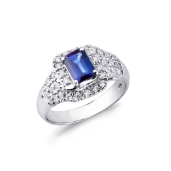 Diamonds and central blue sapphire ring in white gold 18k