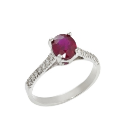 Ring with a central ruby and diamonds shoulder set