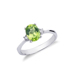 18k white gold ring with peridot and two diamonds on each side