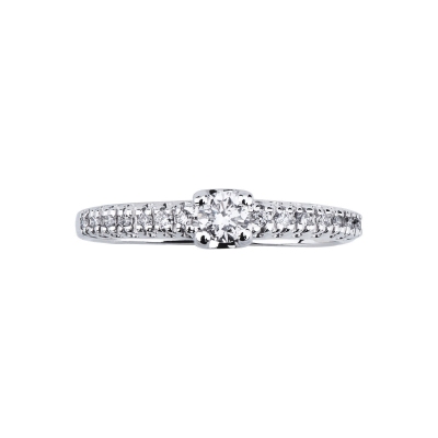 White gold 18k solitaire type ring with diamonds 