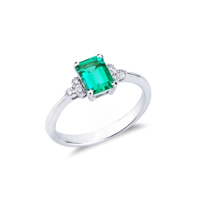 White gold 18k ring with an emerald and three bezel diamonds 