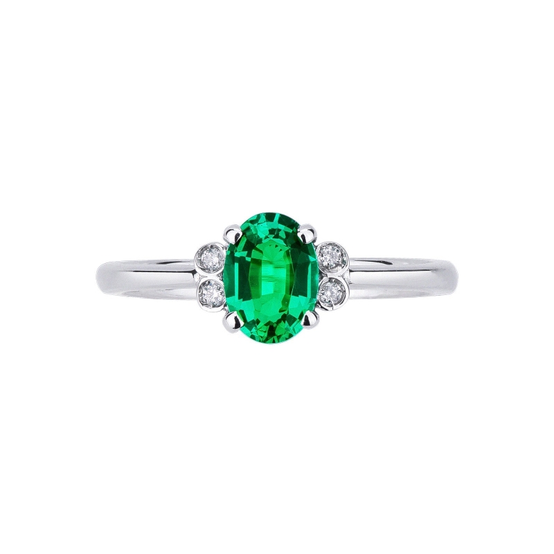 18k white gold ring with emerald and diamonds 