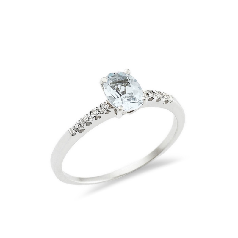 White gold 18k ring with a central aquamarine and diamonds shoulder set
