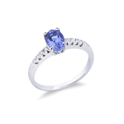 White gold 18k ring with diamonds shoulder set and a central tanzanite