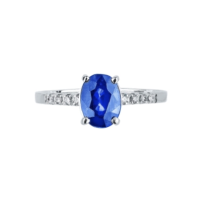 18k white gold ring with side diamonds and central blue sapphire